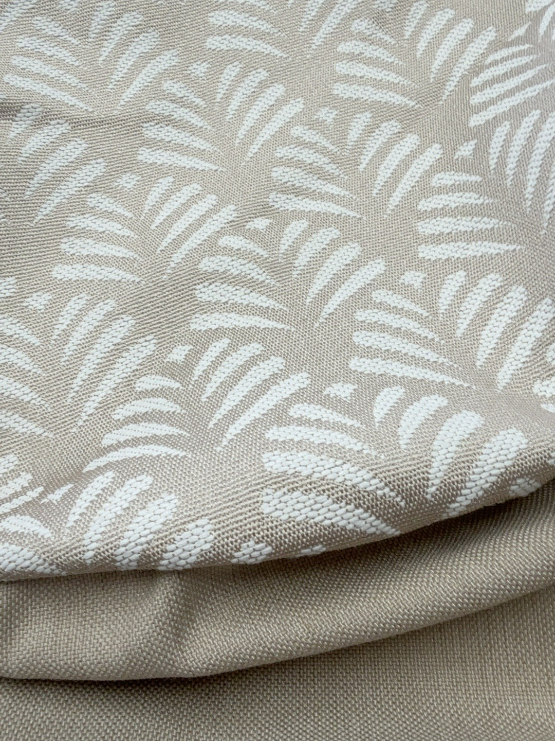 Fabric close-up for one-off small round ottoman, Lomani Shell and Sosa Natural