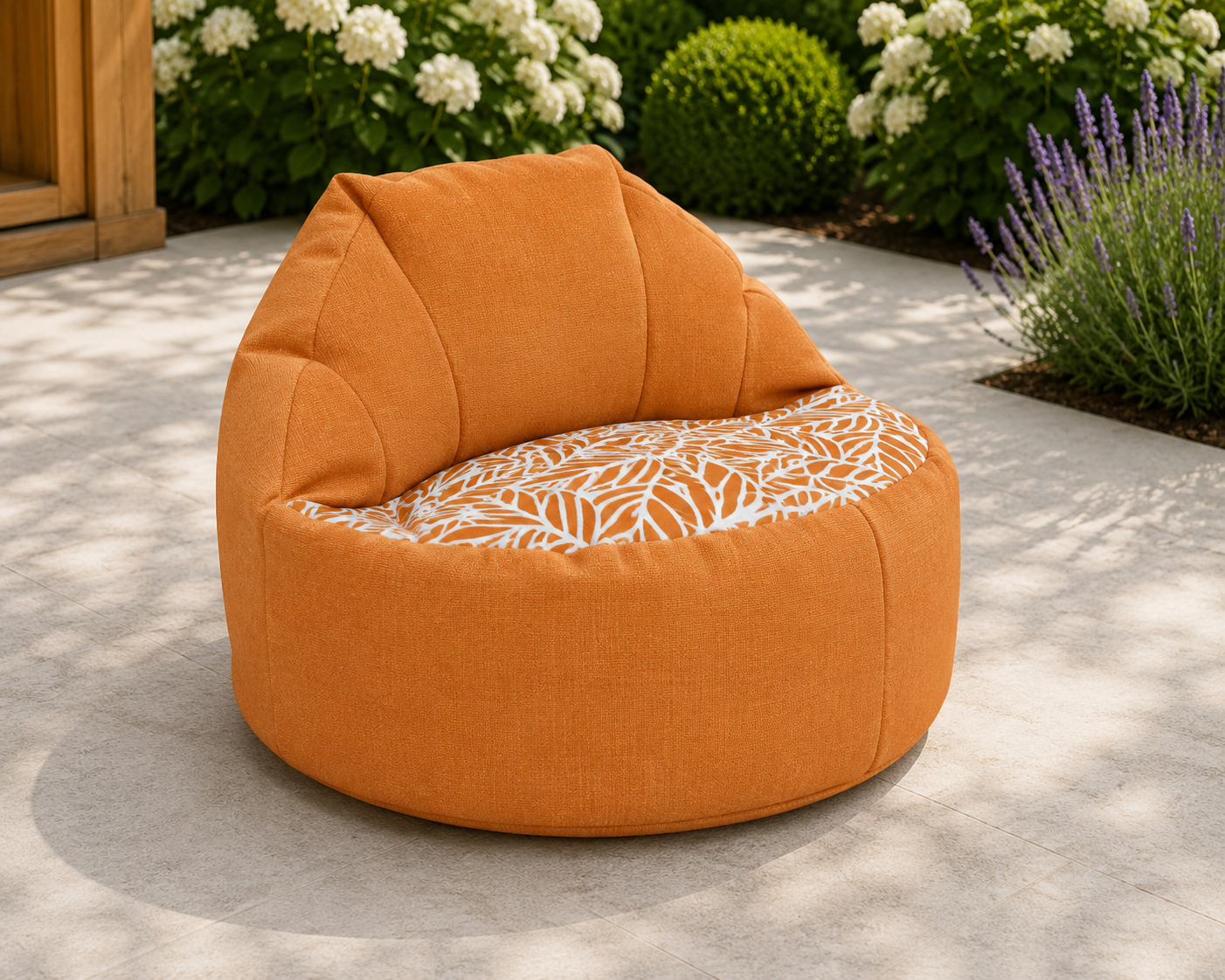 Orange bean bag chair with a patterned seat on a patio