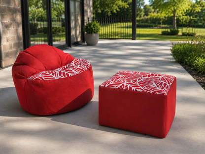 Red bean bag chair and ottoman with white pattern on a patio