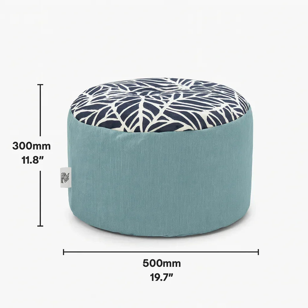 Teal ottoman with leaf patterned top, dimensions displayed