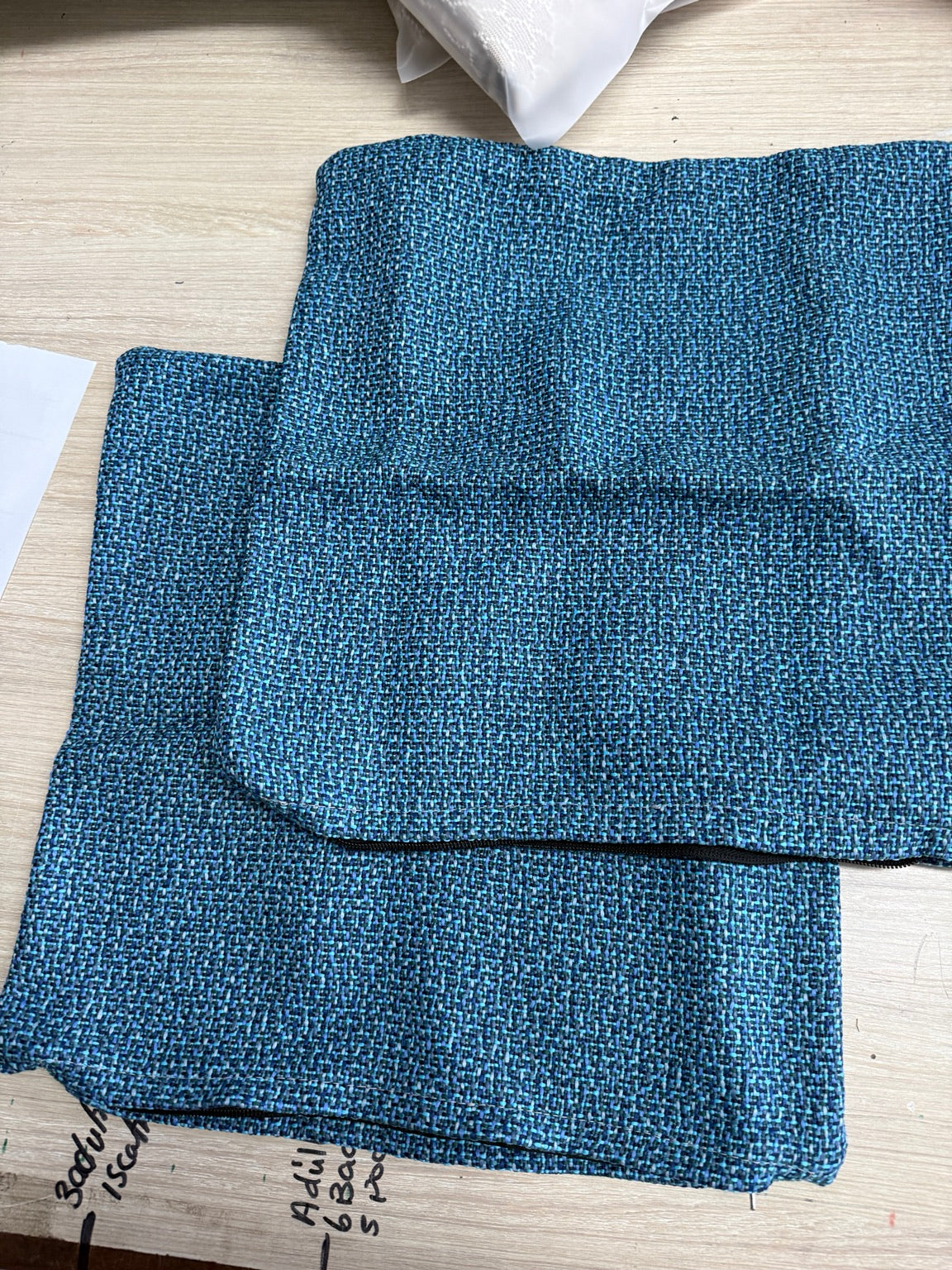 Actual Kuata Lagoon blue woven fabric on the Lazy Beanz cushion covers, supplementary detail photograph